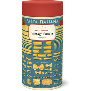 The Cavallini & Co. Pasta | 1,000 Piece Jigsaw Puzzle comes in a cylindrical box featuring colorful pasta shapes and names on a blue background, offering hours of fun for puzzle lovers.